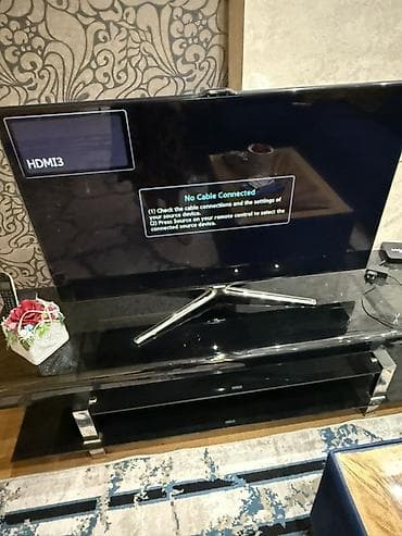 tv 107 ekran: Samsung LED televizor, diaqonal təxminən 46–50”. Qara, nazik çərçivəli — 2
