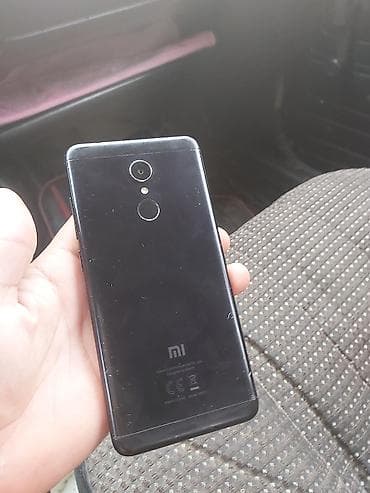 ikinci əl iphone 15: Redmi 5 prablemi ekran susesinde asagda yungul çati var barmaq izi üz — 3