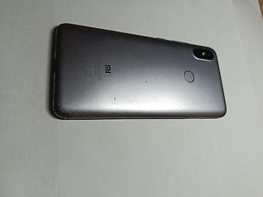 mi smart: Xiaomi smartfon - Korpus: metalik-boz arxa panel, arxa tərəfdə barmaq — 1