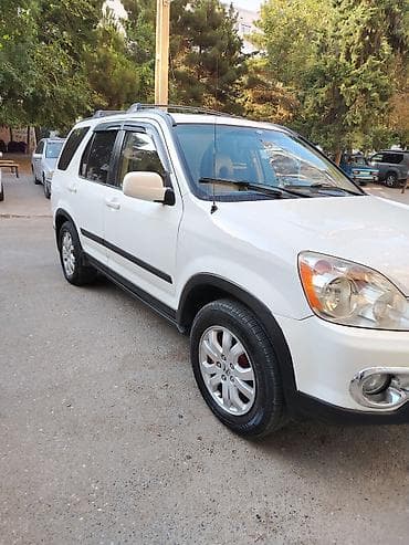 ov tir: Honda CR‑V, ağ kuzov, 5 qapılı SUV. Texniki və komplektasiya — 7