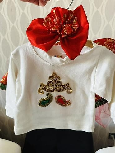 Uşaq geyimi və ayaqqabıları: Milli üslubda qız uşağı üçün 3 hissəli dəst Tərkibi: - Uzunqollu ağ — 2