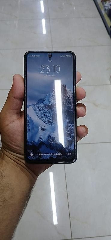 ucuz macbook: Xiaomi Redmi smartfon - Model: Redmi (arka qapaqda “Redmi” loqosu) — 3