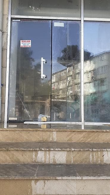 Şuşe,alminium,plastik qapilarin temiri ve quraşdirilmasi.taxta qapiya