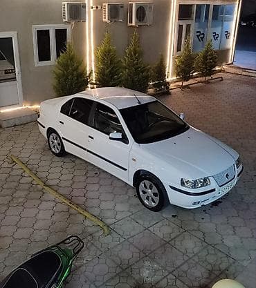 samand: İran Khodro Samand sedan Xüsusiyyətlər: - Kuzov: 4 qapılı sedan, ağ — 3