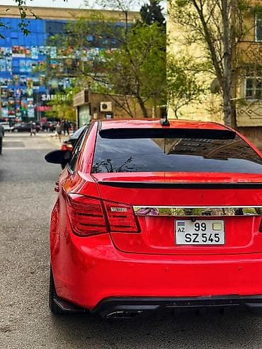 sport disk: Chevrolet Cruze sedan – parlaq qırmızı rəngdə, tam bədən kiti və idman — 1