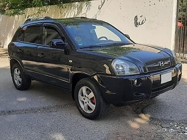 changan uni t: Hyundai Tucson: 2 l | 2007 il Krossover — 1