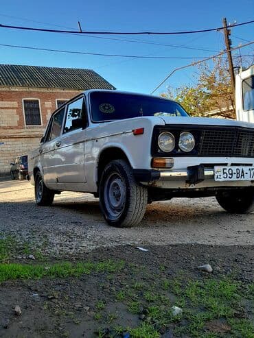 opel suret qutusu: VAZ 2106, ağ rəng, sedan kuzov. Klassik dörd fara ön panel, xrom — 4