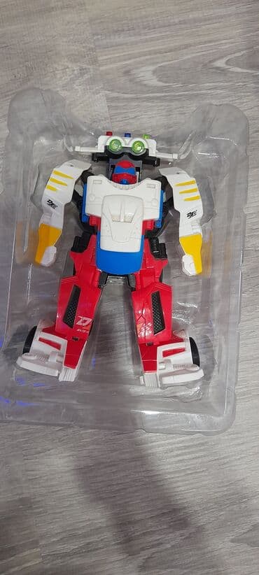 oyuncaq buldozerlər: Az islenmis hen robot hem masin,musiqili duymeleri var . 15man — 4