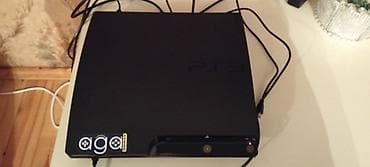 Sony PlayStation 3 Slim oyun konsolu - Model: PS3 Slim (yuxarıda