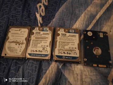 Modemlər və şəbəkə avadanlıqları: Sərt disk (HDD) Western Digital (WD), 1 TB, 7200 RPM, İşlənmiş — 1