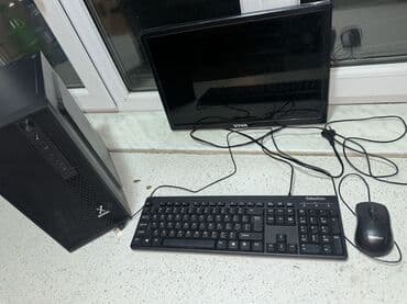 Masaüstü kompüterlər və iş stansiyaları: Ofis və ya ev istifadəsi üçün nəzərdə tutulmuş qara rəngli stolüstü — 1