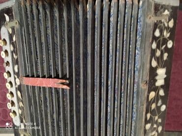 Qarmon, Akustik, İşlənmiş, Ünvandan götürmə