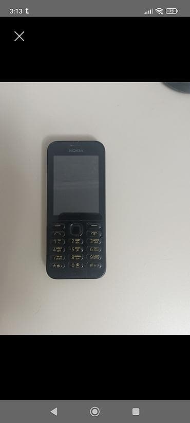 Техника и электроника: Nokia цвет - Черный, Кнопочный — 1