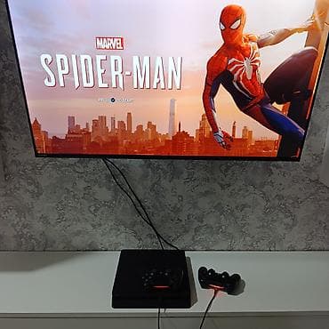 oyun konsoli: PS4 slim 500gb zavod plombu üzərində, ideal vəziyətdə 2pult +10 oyun — 2