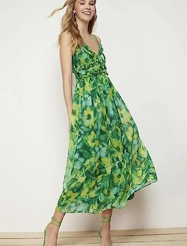 Yaşıl çalarların akvarel effektli çiçək naxışlı qadın paltarı -