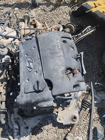 kiçik ventilyator: Hyundai benzin mühərriki – DOHC 16V - Marka/model: Hyundai (qapaqda — 2