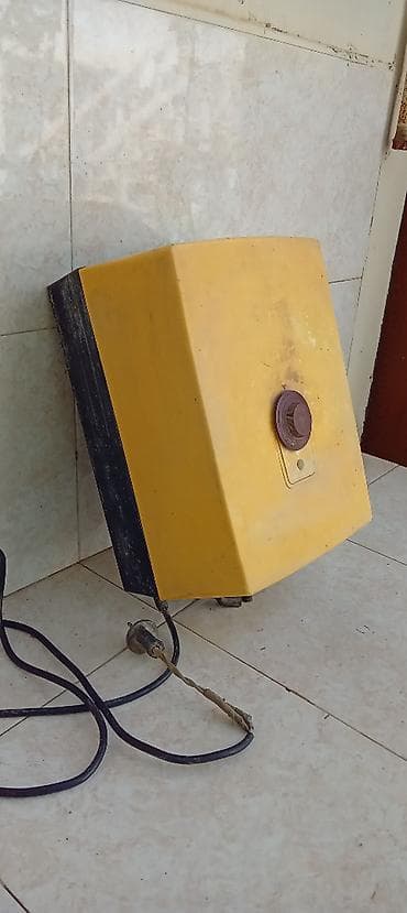 kombi fan matoru: Sovet dövrünə aid elektrikli su qızdırıcısı (divara asılan tip). - — 2