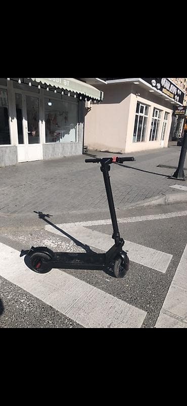 электро сомакат: Elektrik skuter – qara rəng, yığcam və şəhər üçün ideal — 4