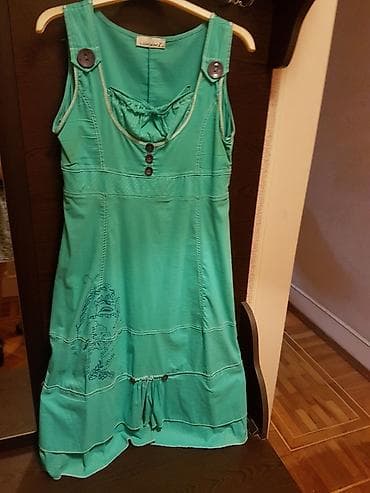 giyim: Sarafan. Türkiyə istehsalı. Ölçüsü - 44. Rəngi - firuzəyi. Qiyməti - — 1