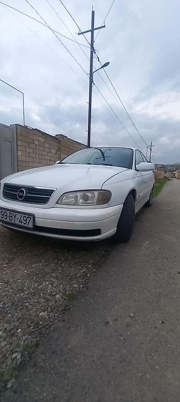 авто фольксваген: Opel Omega B sedan – ağ rəngli, avtomatik ötürücülü. Tecili satilir — 2