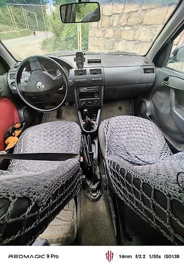 Volkswagen Polo: 1.8 л | 2005 г. Универсал