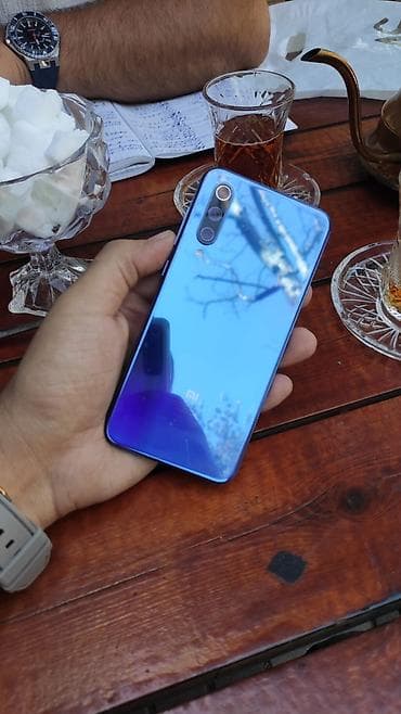 macbook pro 2017 i5: Xiaomi Mi 9, rəng - Mavi, 
 İki sim kartlı — 1
