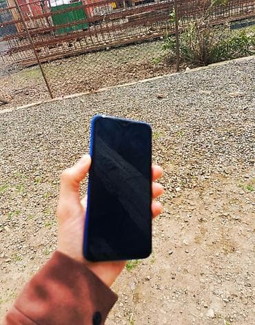 телефон fly fs502 cirrus 1: Xiaomi Mi Play, 64 ГБ, цвет - Голубой, 
 Отпечаток пальца — 4