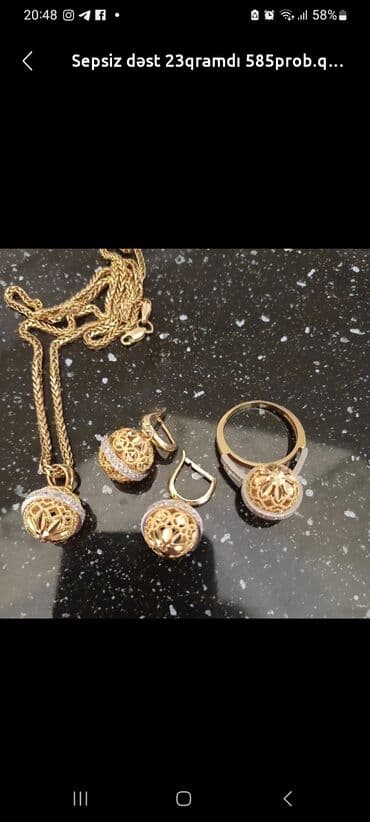 italyan qizili: Dəstə daxildir: Üzük, Sırğa, Kulon, Sarı qızıl, 585 Əyar, 23 g — 3