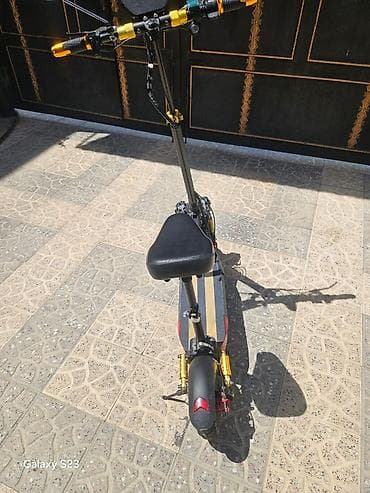 Elektrik nəqliyyatı: Elektrikli skuter – oturacaqlı model Xüsusiyyətlər: - Güclü ön ikili — 4