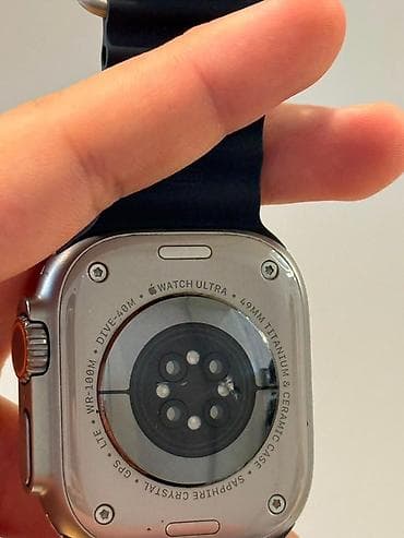 su despensoru: Apple Watch Ultra 49 mm – Titan və keramika korpus, safir kristal arxa — 1