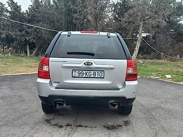 arxa bufer: Kia Sportage – gümüşü rəngdə kompakt krossover/SUV Xüsusiyyətlər: - — 3