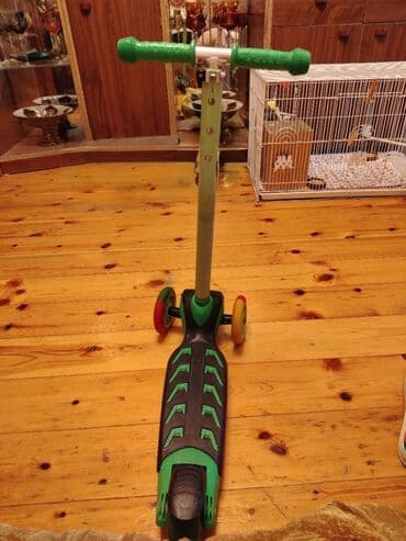 самокаты в баку: Yaşıl və qara rənglərdə olan bu uşaq skuteri uşaqlar üçün idealdır — 3