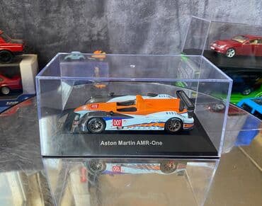 где можно продать марки: Коллекционная модель Aston Martin AMR-One #7 Gulf Team LeMans 2011 — 6