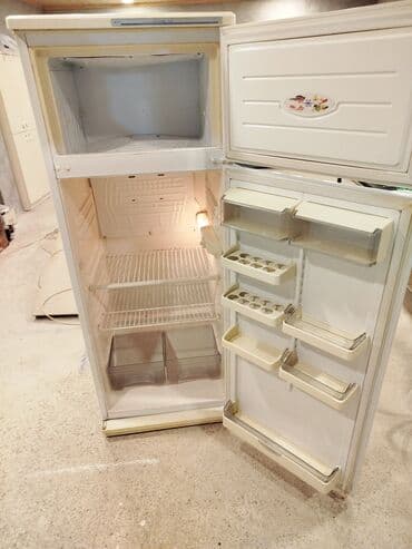 soyuducu gəncə: İki qapılı soyuducu (üst hissədə dondurucu) Xüsusiyyətlər: - Üstdən — 1