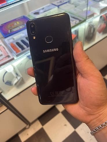 macbook barter: Samsung Galaxy A10s, 32 GB, rəng - Qara, Zəmanət, Barmaq izi, İki sim kartlı — 1