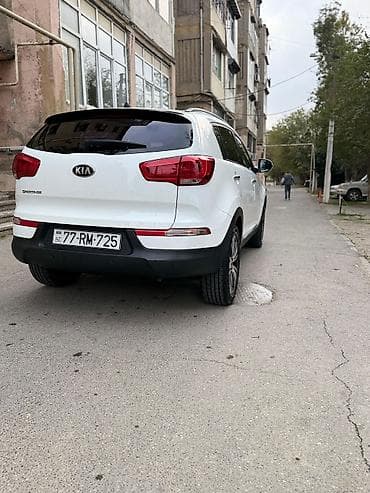 tesla disk: Kia Sportage, ağ rəng, kompakt krossover. Güclü və qənaətcil — 6