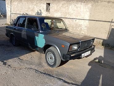 ot bicen traktor satisi: Model: Lada 2107 sedan Rəng: Tünd boz/göy tonları Kuzov: 4 qapı — 2