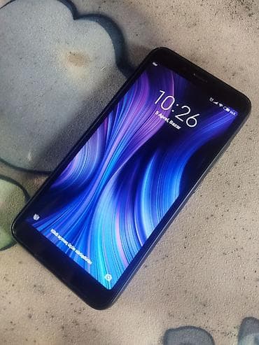 tikanlı tel: Smartfon – qara rəng - Ekran: təxminən 5.5–5.7 düym, HD/Full HD sinfi — 1