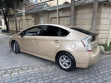 tap az prius: Toyota Prius (III nəsil) hibrid liftbek - Rəng: açıq qızılı/bej, qara — 4