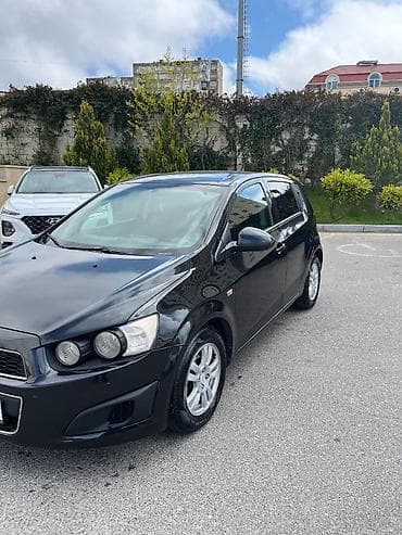 Chevrolet: Chevrolet Aveo: 1.4 л | 2013 г. 182601 км Хэтчбэк — 7