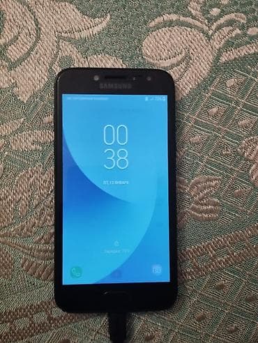 samsung j2 (2018): Samsung 16 GB, rəng - Qara, İki sim kartlı — 3