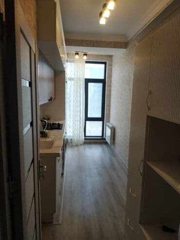 naxcivan kiraye ev elanlari 2024: Nərimanov rayonuTəhsil nazirliyinin yanında,15 mərtəbə, Yeni tikili — 8