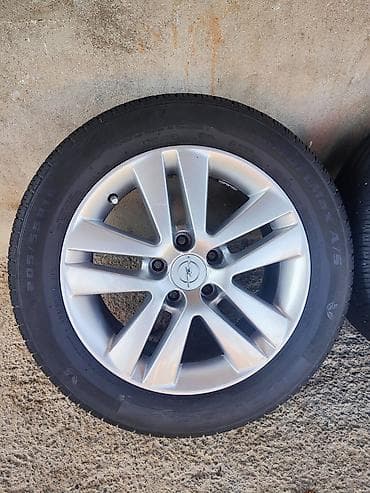 passat disk: Opel orijinal yüngül lehimli disklər və şinlər komplekti - Disklər — 1