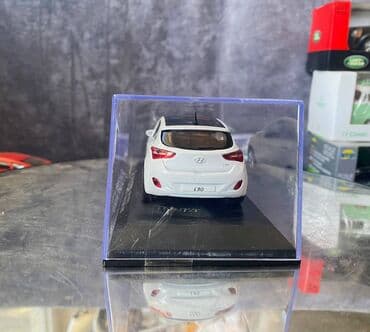 maşın modeli: Коллекционная модель Hyundai i30 5 door white 2012 Pino B&D Scale — 9