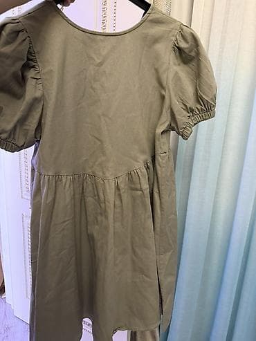 donları: Uzunluğu dizdəndir, sadəcə 2 dəfə geyinilib. Zeytun-yaşıl rəngdə — 1