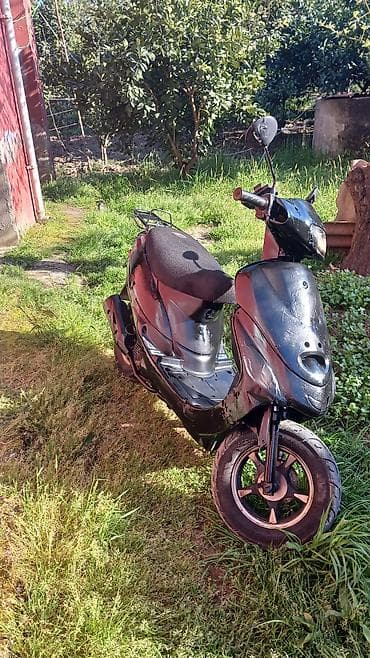 dubaydan avtomobil ehtiyat hisseleri: Şəhər içi rahat gediş-gəliş üçün kompakt skuter. - Kuzov rəngi: qara — 1