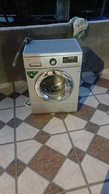 komputer kontakt home: LG paltaryuyan maşın. Öndən yükləməli modeldir. Korpus üzərində — 1