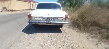 diffuser satisi: Model: GAZ Volga (GAZ-24 seriyası) Kuzov: sedan, ağ rəng Nömrə nişanı — 4