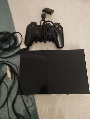 PlayStation 2 Slim oyun konsolu komplekti - Model: Sony PlayStation 2