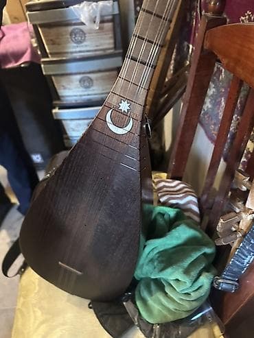 Gitaralar: Elektro-çılqılı saz - Korpus: ağacdan hazırlanmış, tünd rəngli, yan — 2